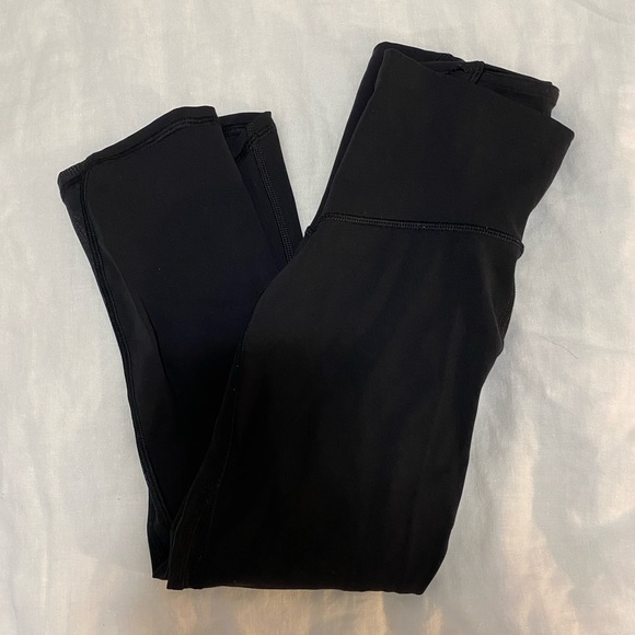 3/4 length black lululemon leggings w/ sheer panel